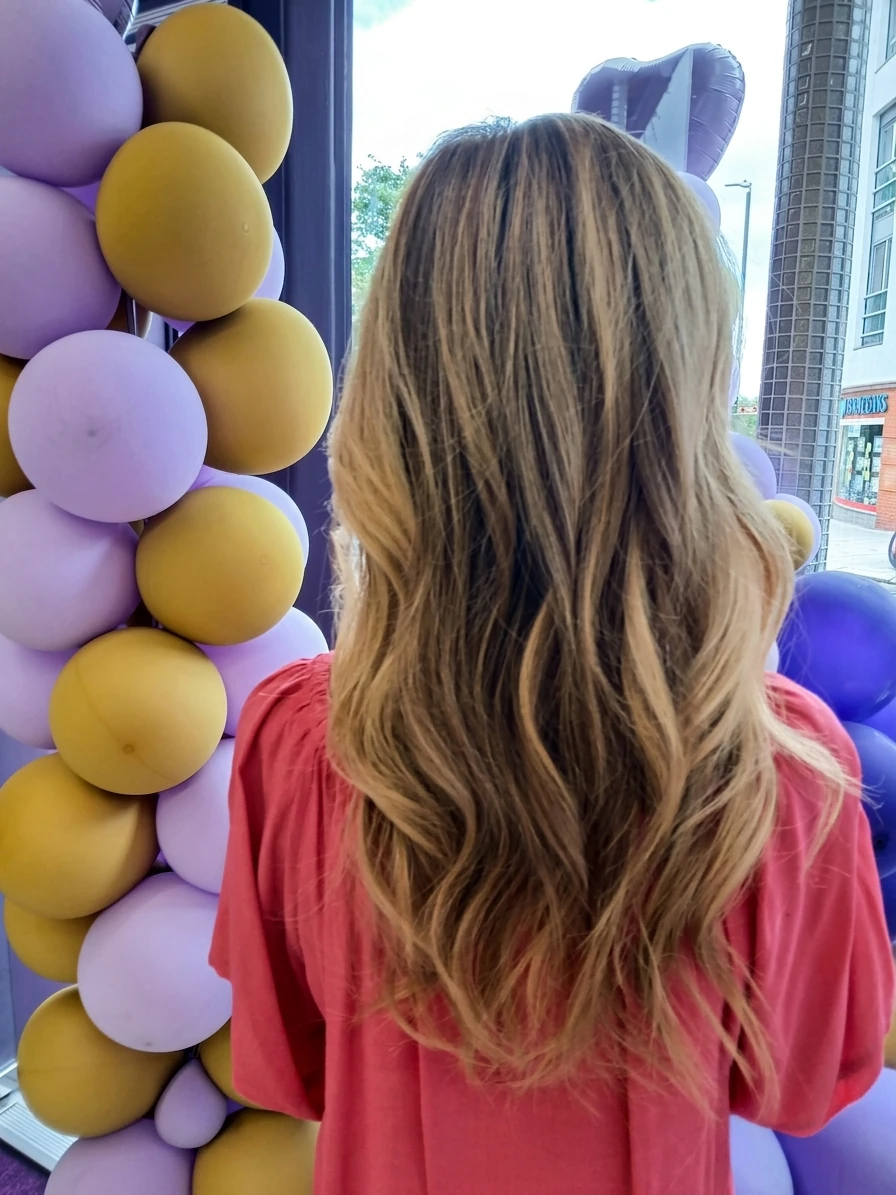 Long blonde balayage on wavy hair by Bobby — L'Oréal Certified Colour Specialist at The Village Edit, Wimbledon Village