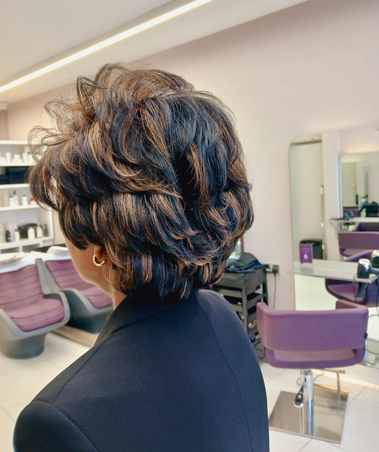 Warm balayage on a bob, created tone by tone at our Wimbledon Village hair salon