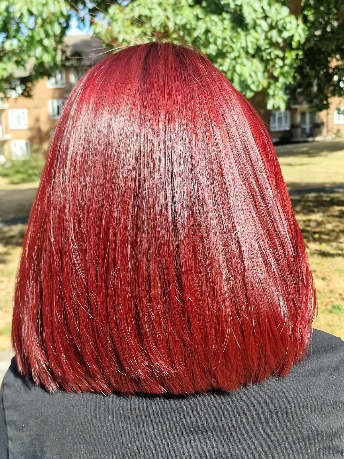 Deep red hair colour on shorter hair by Bobby, L'Oréal Certified Colour Specialist at The Village Edit, Wimbledon Village