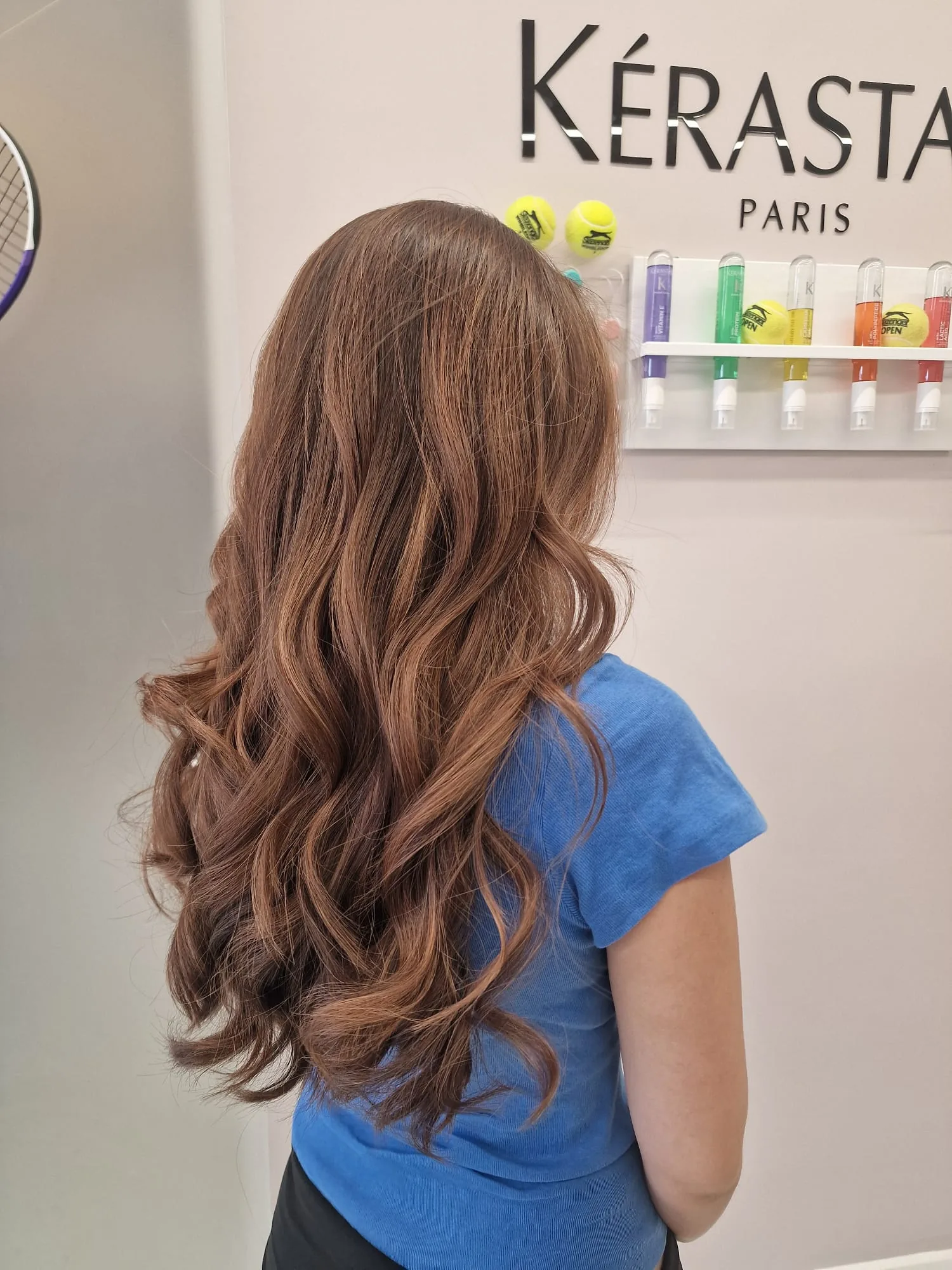Long brunette hair cut and finished with a waved blow-dry at The Village Edit, Wimbledon Village