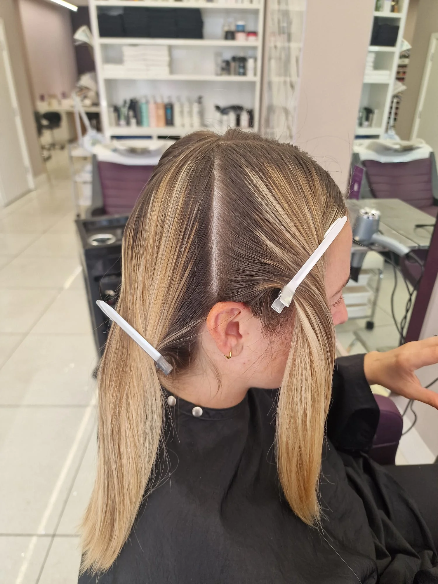 A full head of highlights being sectioned and placed by hand at The Village Edit, Wimbledon Village