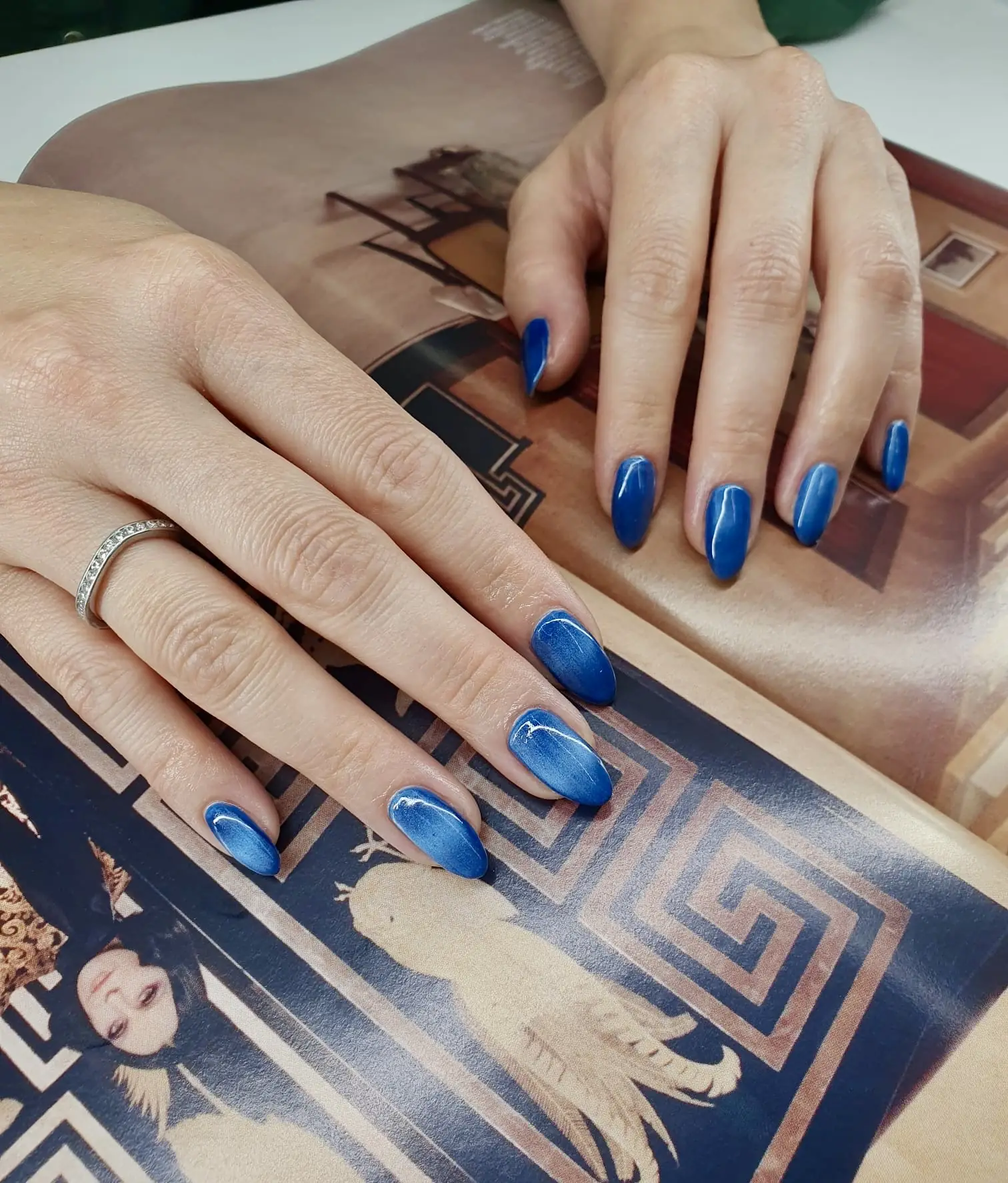 Sapphire blue almond-shaped manicure by Ivana — Nail Technician at The Village Edit, Wimbledon Village